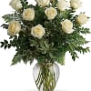Pure joy! Two dozen wondrous white roses take center stage in this