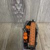 Coffin shaped surprise box, with a Halloween themed wrist strap, keychain and