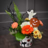 Boo! Don&#039;t be scared, it&#039;s just flowers. A ghost floating above a
