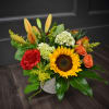 Channel summer into fall with this sunny arrangement. Featuring all of the