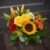Channel summer into fall with this sunny arrangement. Featuring all of the
