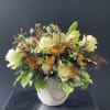 Earthen Elegance &ndash; A captivating blend of purity and opulence, this arrangement
