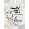 Made of glass with a ribbon for hanging, this ornament comes gift