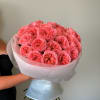 An opulent bouquet of garden roses, radiant in pink elegance and timeless