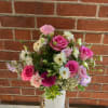 Hand-picked blooms in gentle blush tones, carefully arranged to celebrate the beauty