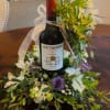 Pick a complementary bottle of wine with any flower arrangement. We will
