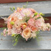 A lovely peach arrangement with a monochromatic peachy pink color scheme. This