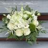 An elegant arrangement with a classic and fresh green and white color