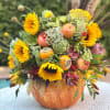 You can order this beautiful Fall centerpiece arranged in a real orange