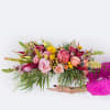 Our long and low arrangement features the best florals the season has