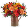Terra Bloom Bouquet includes fresh orange roses, orange spray roses, maroon miniature