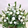  Beautiful rose basket with greenery and fillers - an elegant tribute