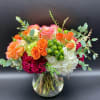 Colorful design of hydrangea, roses, spray roses and hypericum berries that is