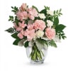While its blooms may be soft and gentle, this bouquet speaks volumes