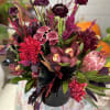 Let our florist design a spooky arrangement for you or tell us
