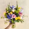 Designed for the free spirited! This bouquet full of wild flowers and