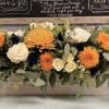 Orange disbud cremones, white playa blanca roses, orange cremone, white spray roses