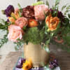 This elegant fall centerpiece is a beautiful mix of roses, hydrangea and