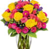 Bright yellow roses and hot pinks are sure to lift anyone&#039;s spirit!