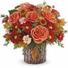 Capture their admiration with this enchanting fall rose arrangement, elegantly complemented by