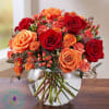 All-around arrangement with red roses and hypericum, orange roses, spray roses and