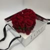 Beautiful silver box with a center of red roses in the shape