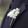 Classic white and light blue blooms and greenery are showcased on a