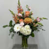 A beautiful sunrise of soft colors such as peaches, pinks &amp; rust