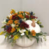 Bright fall colors really pop inside this beautiful white ceramic pumpkin, perfect