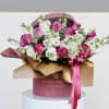Stunning arrangement of Deep Purple Roses and white Stock, combine with a