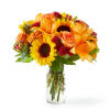Capturing the beauty of the season, this arrangement brings all the warmest