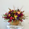 Embrace the warmth of autumn with Fall Fiesta by Westford Florist. This