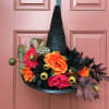 SILK/ARTIFICIAL flowers Witch Hat arrangment. All designs are unique!