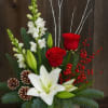 White flowers, red roses, pine cones, white lily, berries and white sticks