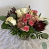 A soft more muted Autumn arrangement with a hint of blush tones.
Including