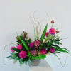 Commanding and seductive, this arrangement lives up to its name. Bold protea