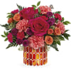 As mesmerizing as a fall sunset, this majestic mix of colorful roses