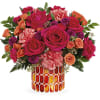As mesmerizing as a fall sunset, this majestic mix of colorful roses