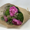 Seasonal peonies with fillers and greens arranged into a hand-tied bouquet. 

Please