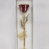 A real rose preserved to last and then trimmed with real 24kt