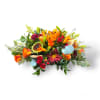 This beauty is packed with lilies, roses, carnations, and assorted foliage&rsquo;s perfect