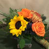 Seasonal collection of lasting blossoms such as thistle chrysanthemums.Starting size is prepared