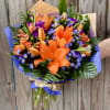 Orange lilies with purple flowers make this wrap a favorite for many!