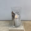 A beautiful glass cylinder holding a led candle printed with the verse
