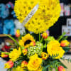 Beautiful floral arrangement in the shape of a heart, consisting of yellow