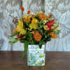 Butterscotch and yellows brightens the harvest season in cute keepsake glass cube.