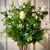 One Dozen Premium White Roses with tropical foliage, designed in a silver