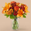 Breathe in the change of seasons with this alluring blend of oranges