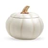 Elegant cr&egrave;me roses blend with the heartwarming hues of autumn in this