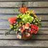 Our autumn pumpkins are back. Ceramic pumpkin, filled with seasonal fall flowers